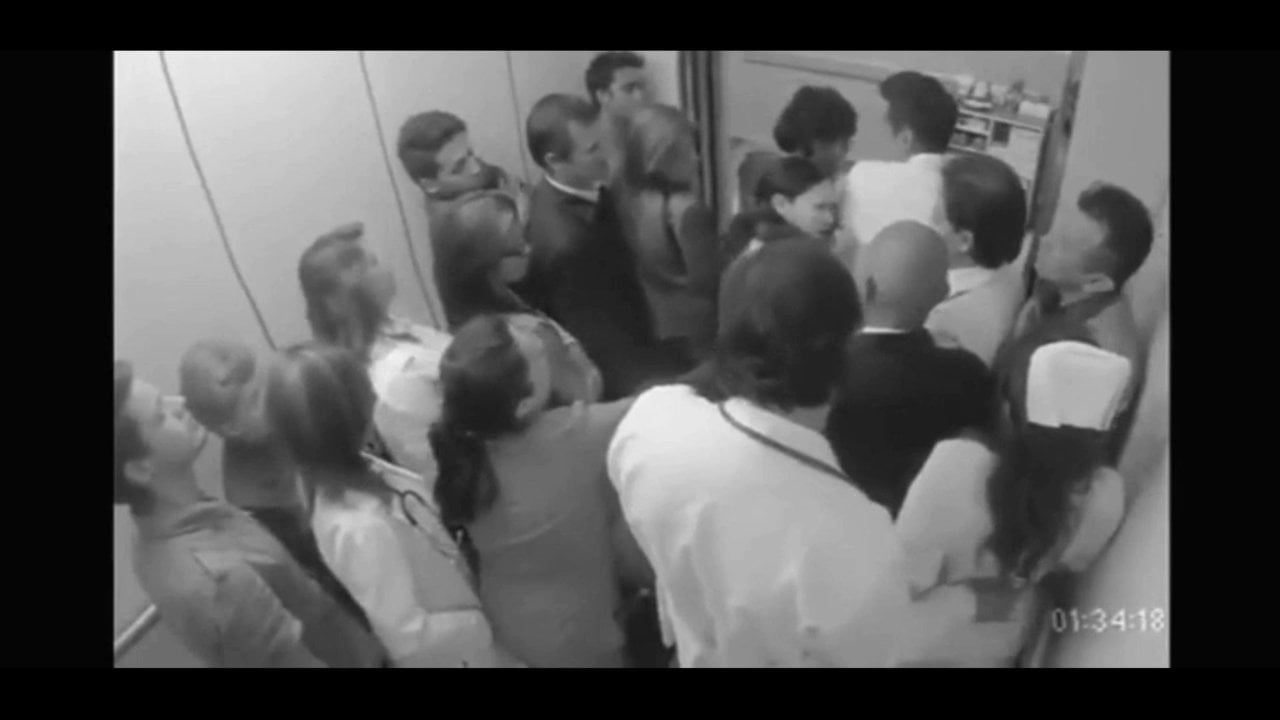 Doctor Gropes Nurse In Elevator Full Of People