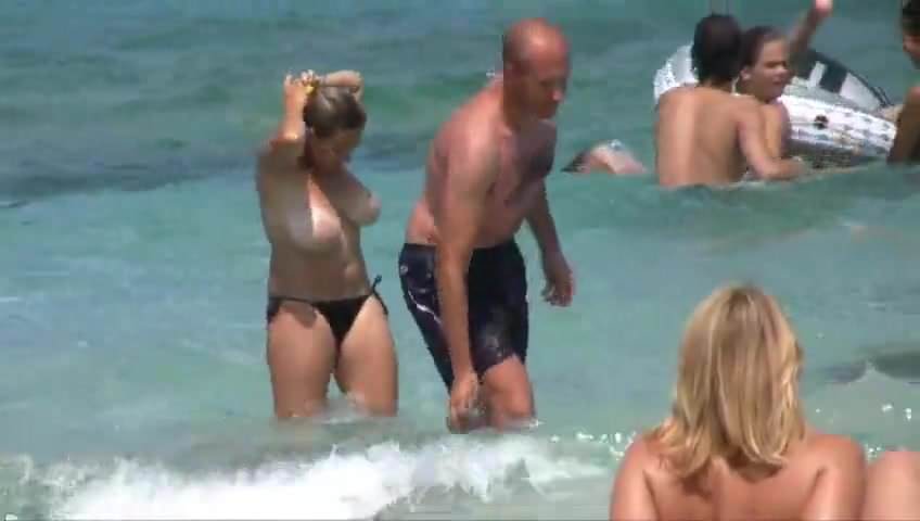 tan lines big boobs at beach black bikini topless