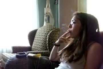 Elizabeth Douglas age 18 learning to smoke Virginia Slims