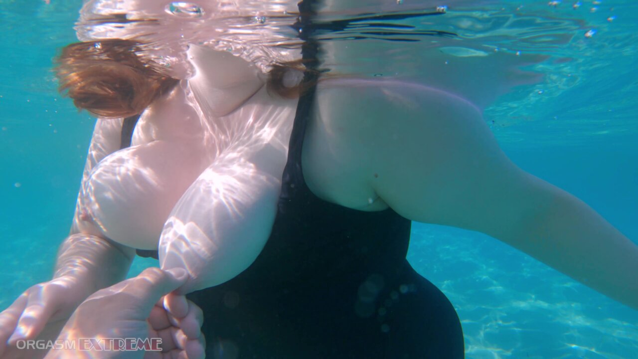 Underwater Footjob Sex and Nipple Squeezing POV at Public Beach - Big Natural Tits PAWG BBW Wife Being Kinky on Vacation photo