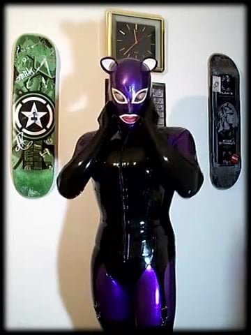 Latex Cat Girl, Shining Her Rubber Catsuit