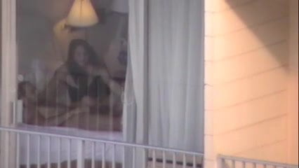 couple having sex voyeur through HI hotel window