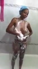 Ivorian girl showering