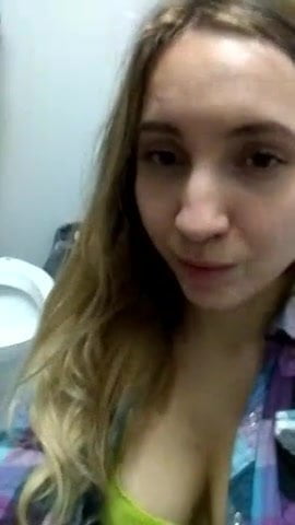 Youtuber Lexi P teasing in a public bathroom