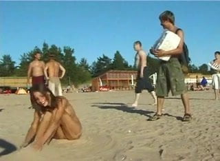 Spy nude girl picked up by voyeur cam at nude beach
