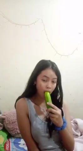 Hot indonesian with cucumber in her pussy